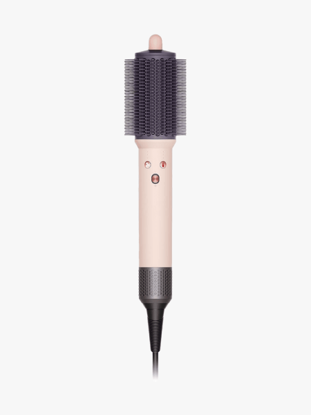 Dyson Airsmooth Styling Brush in branded component on a light gray background